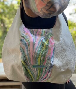 candy river creamsicle marbling study on a one of a kind shoulder bag